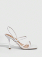 Cuccoo White Criss Cross Heels