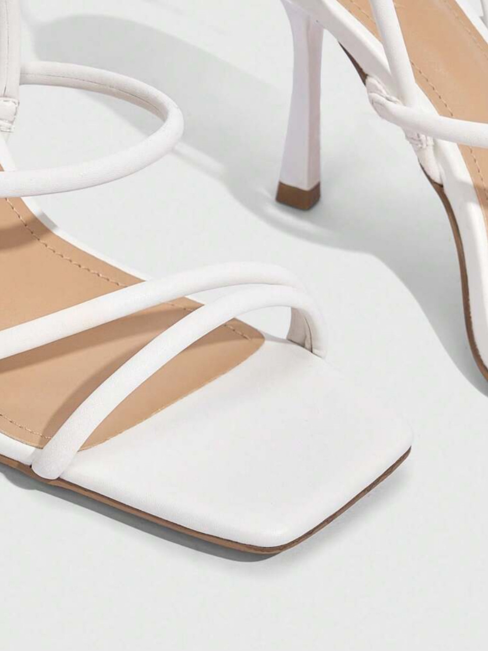 Cuccoo White Criss Cross Heels